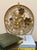This vintage Hollywood Regency style gold metal wall art features traditional Asian inspired 3-dimensional floral branches...
