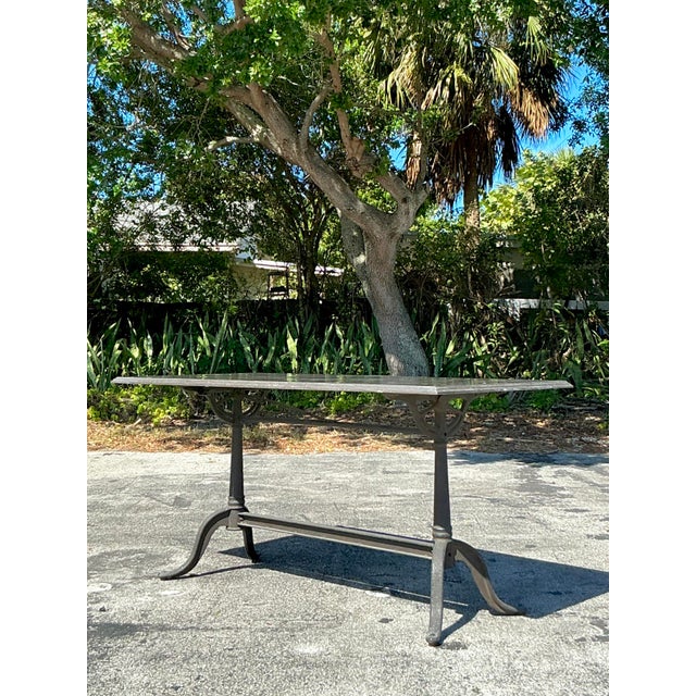 Add timeless elegance to your dining space with this vintage Regency stone top café dining table. Featuring a sleek stone...
