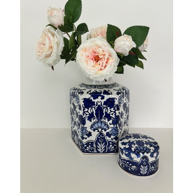 This beautiful blue and white ginger jar will add charm to any surface. (Ginger jar only; no flowers are included.) No...