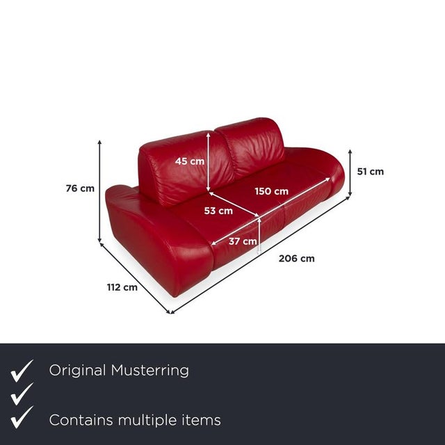 This Musterring leather suite is a striking duo that combines modern design with a passionate color palette. In vibrant...
