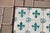 Antique 19th Century Portuguese Heraldic Motif Tiles With Teal Fleur-De-Lis Set of 28 For Sale - Image 6 of 14