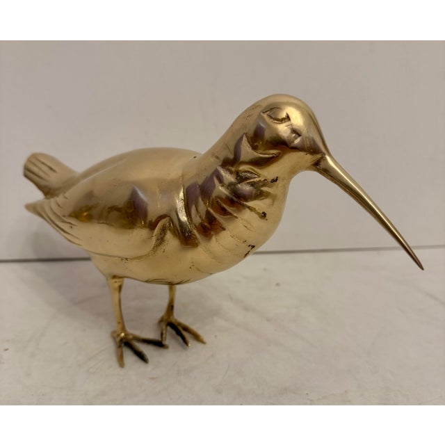 Vintage Hollywood Regency Brass Sandpiper Shore Bird Sculpture. Nicely detailed. Hand polished. Light or dark spots are...