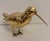 Vintage Hollywood Regency Brass Sandpiper Shore Bird Sculpture. Nicely detailed. Hand polished. Light or dark spots are...