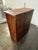 Design Plus Gallery presents a Vintage Carved Wood Cabinet. The rectangular case is framed by molded trim along the top...