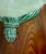 A pair of Danish Art Deco wall sconces in molded clear frosted glass shades with flowers motif details mounted in a...