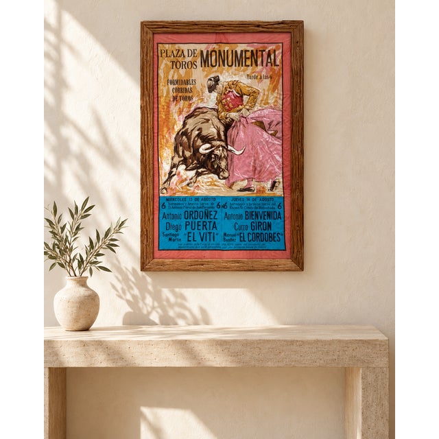 Vintage Spanish bullfighting textile poster dating from 1969, presented in an old rustic wooden frame. The textile depicts...