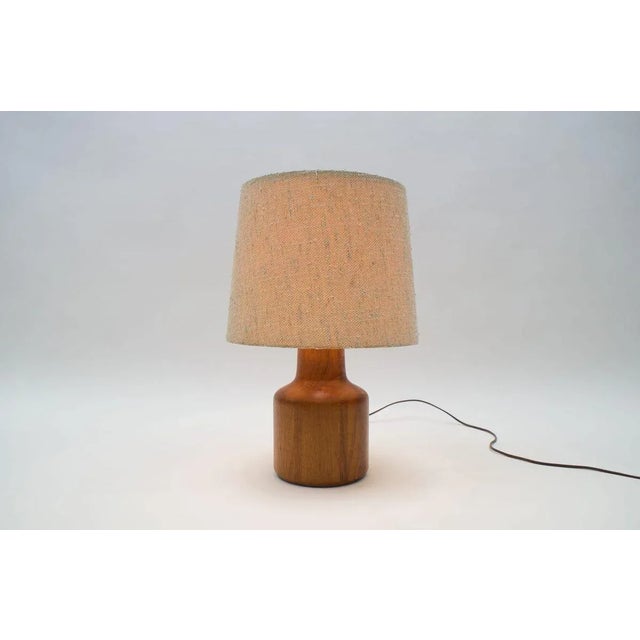 Danish Teak Table Lamp, 1960s, in Very Good conditions. Designed 1960 to 1969 European Plug (up to 250V).The wiring of...