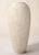 The Italian Classic Riven Travertine Venice Cone Vase attributed to Fratelli Manelli for Raymor is a versatile element...