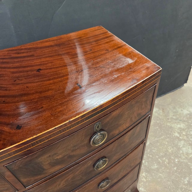 This Handsome Flame Mahogany Georgian 5 drawer bowfront chest on splay feet would be great in a bedroom or as an accent...