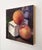 Realism Two Peaches by Yana Beylinson | Oil on Board Still life of two peaches on a white box. For Sale - Image 3 of 3