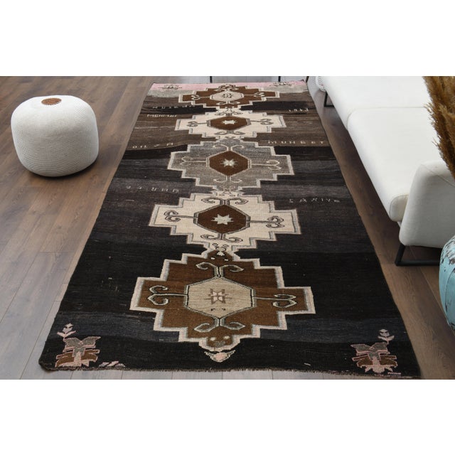 Vintage Turkish Hand-Knotted vintage rug is a vintage kilim area rug.'70s Eastern region of Turkey's unique rug is...