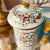 1960s Camille Le Tellac hand-painted jar with flowers and gilt accents // made in Paris // elegant French style decor // porcelain jar with lid For Sale - Image 14 of 18