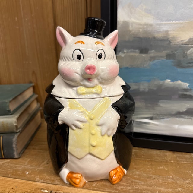 This is charismatic piggy cache pot. 9” by 5”