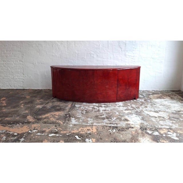 Rare and beautiful Italian sideboard by Aldo Tura with a mottled parchment acrylic-lacquered finish on an oak frame, glass...