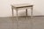 A French painted oak side table from the 19th century. This antique table from France has a rectangular-shaped top, which...