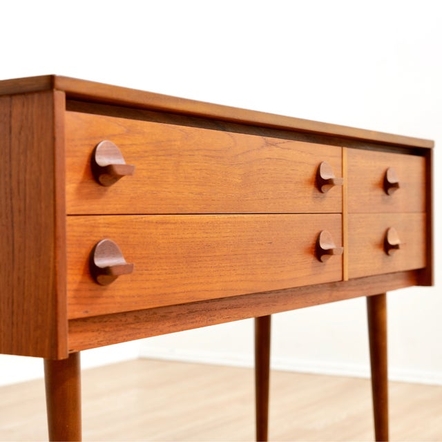 This vintage mid-century console dresser was produced by Stag Furniture during the 1960s. An elegant design produced in...