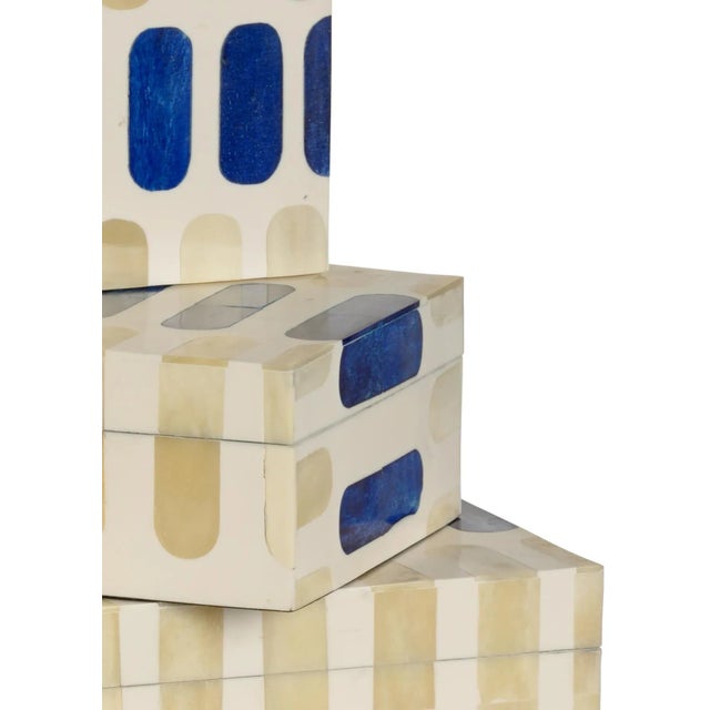 Hand inlaid bone with cobalt blue accents; this set of exquisite boxes are strikingly appropriate for the "waterfront" and...