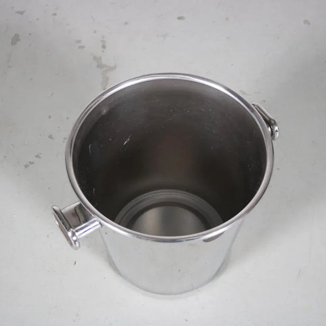 A 1980s champagne cooler designed by Ettore Sottsass and manufactured by Alessi, Italy. This modern designed champagne...