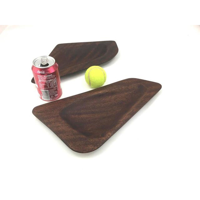 These Scandinavian decorative bowls were made in the style of Tapio Wirkkala.