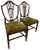 Set of two Hepplewhite period carved dining or game chairs. Green-striped upholstered drop-in seats that are supported on...