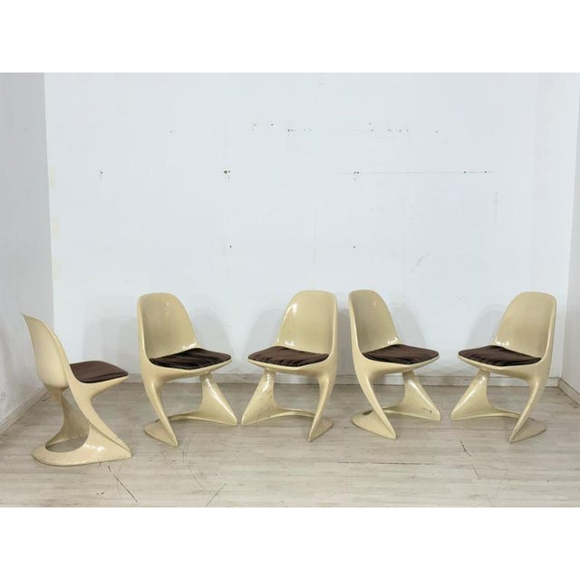 For sale is an original set of five Casalino chairs by Casala in the typical Space Age design of the 1970s. The chairs...