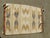 Vintage, mid century Navajo SW Native American rug. Woven wool in earth tones with a Chevron design. Attached to pole, but...