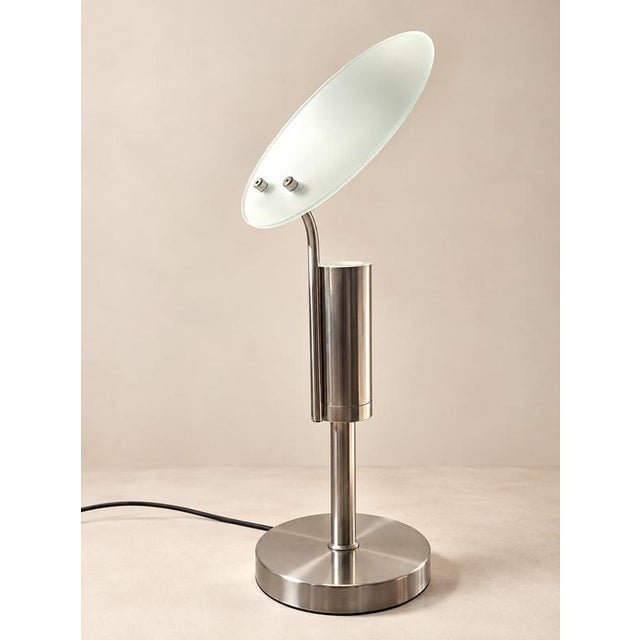 A sculptural table lamp, believed to be french and dating from the 1990s, distinguished by its striking combination of...