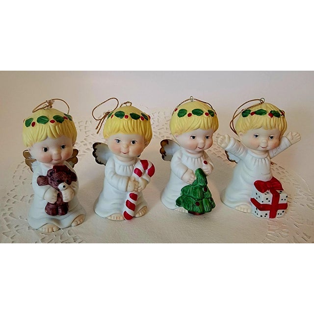 Vintage Bisque Porcelain Angel Figurine Ornaments. Made in Taiwan. Set Of Four. Well preserved and super cute! No chips or...
