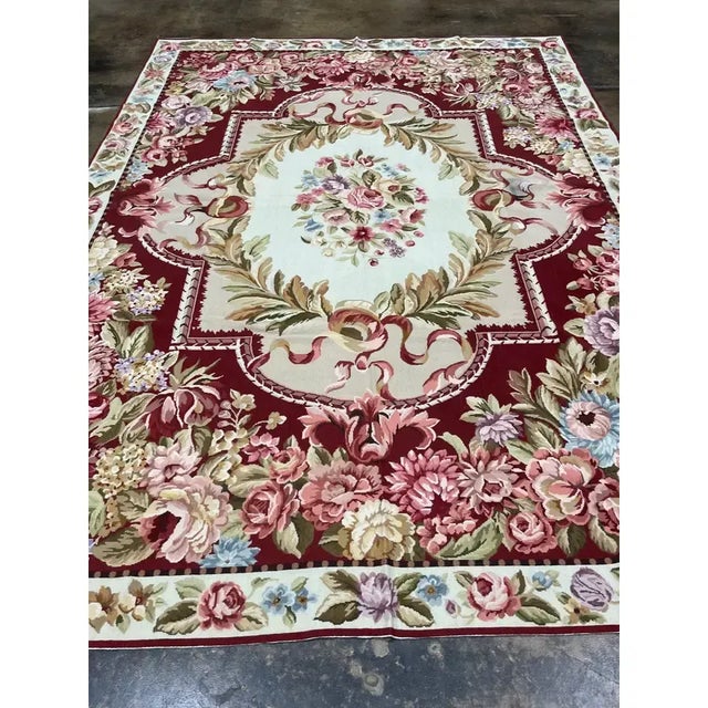 ACTUAL SIZE: 8'0" X 10'0" PRIMARY COLOR: Burgundy AGE: New ORIGIN: China MATERIALS: Wool FOUNDATION: Cotton PRODUCTION:...