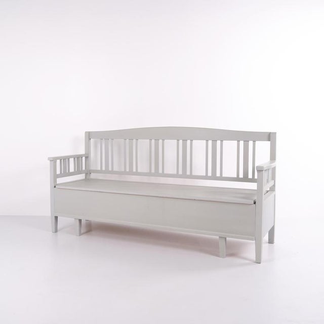 Swedish bench from the 1860s, made in pine and later painted grey. A classic Scandinavian piece with decorative painted...