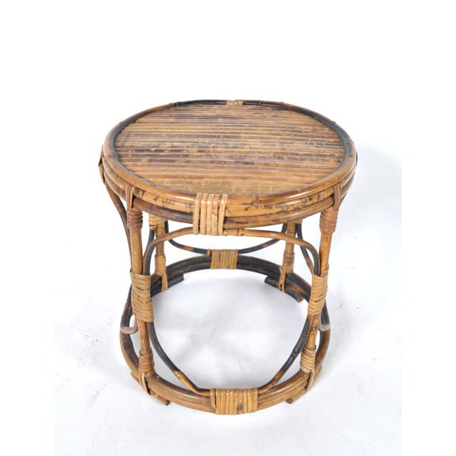 A very attractive and versatile tortoiseshell bamboo table with wicker wrapped joints. Being small, it’s perfect for a...