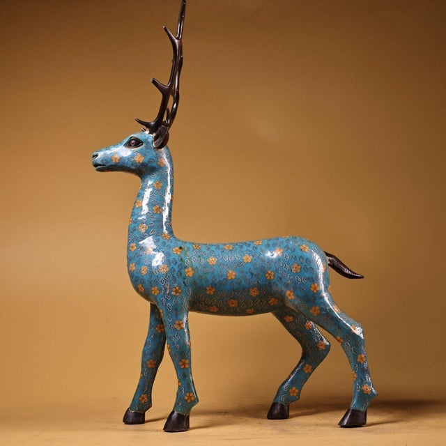 This is a large, finely crafted cloisonné enamel figurine of a standing deer. The body is decorated with a vibrant...