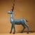 This is a large, finely crafted cloisonné enamel figurine of a standing deer. The body is decorated with a vibrant...