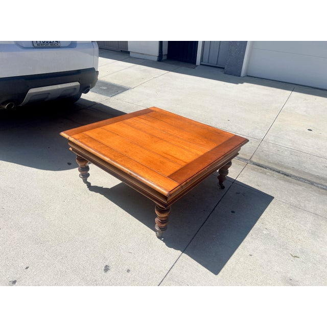 Gorgeous Italian provincial style coffee table with turned legs and caster rollers