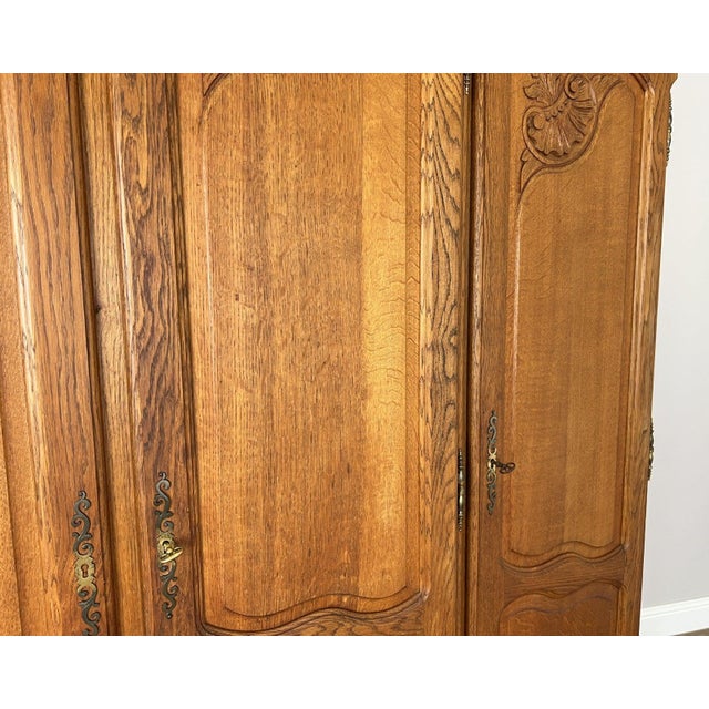 Vintage Louis XVI French Oak Four Door Carved Wardrobe For Sale - Image 6 of 12