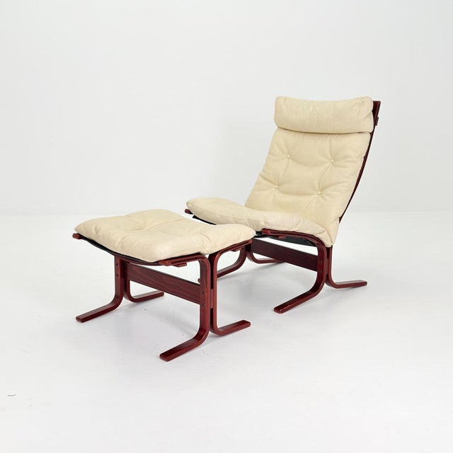 Mid century armchair “Siesta” and ottoman cream white leather by Ingmar Relling, Westnofa Furniture, Norway 1970s A...