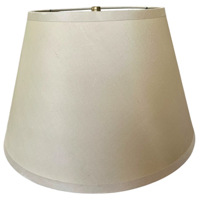 A timeless Restoration Hardware lampshade in an elegant ivory/sand color silk-blend fabric with a softly tailored empire...