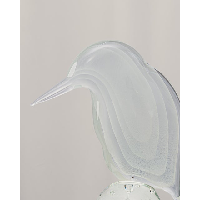 Murano glass sculpture by Licio Zanetti depicting a bird, crafted from clear glass with white sommerso decoration on the...