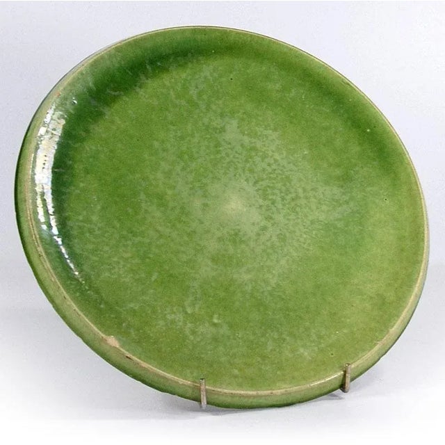 Danish Green Ceramic Dish by Herman A. Kähler (Hak), 1940s, in Worn conditions. Designed 1920 to 1949 This piece has an...