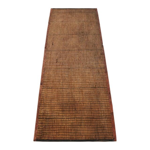 This vintage rug and floor covering is a 2x6 Tuareg runner mat from the nomadic tribe of the same name. Handwoven with...
