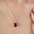 Add a touch of bold sophistication to your collection with this striking ruby pendant, expertly crafted in solid sterling...