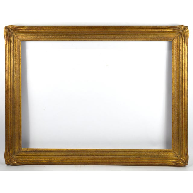 A very finely made art nouveau transitional painting frame. The frame is well made with elegant and flowing corner decor...