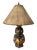 Bring timeless Asian-inspired elegance to your space with this striking vintage Chinoiserie table lamp. The sculptural...
