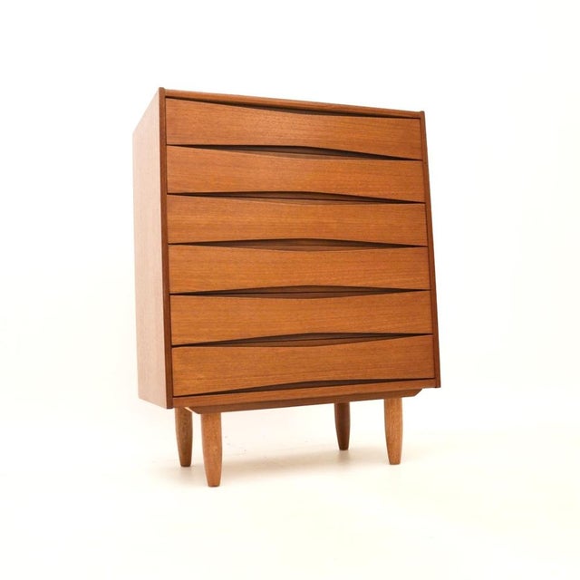 A stylish and extremely well made vintage Scandinavian teak chest of drawers by Skeie & Co. This was made in Norway, it...