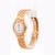 Vintage Rolex Cellini 6621 quartz watch in 18K yellow gold featuring 26mm case with white dial and integrated brick-link...
