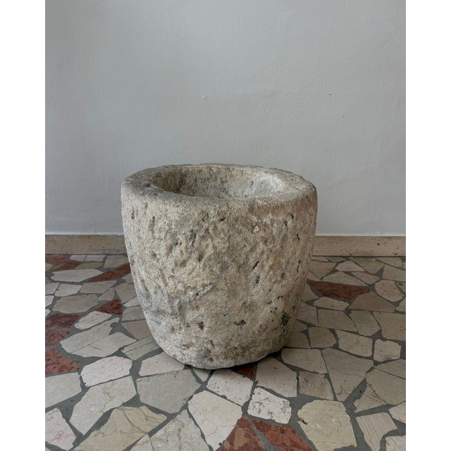 Large 17th-century stone mortar. Italy. This mortar has a porous surface and was carved from a single block of stone,...