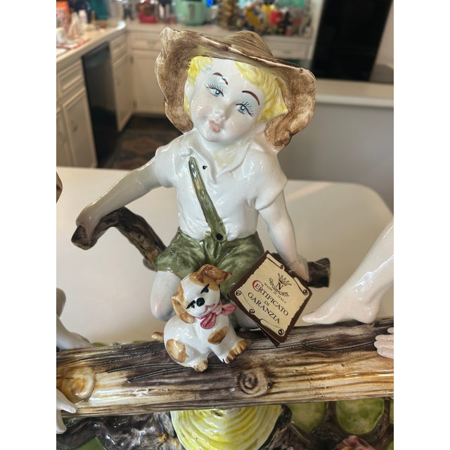 Rustic European Large Capodimonte Porcelain Figural Sculpture of Children and Dog on Seesaw Mid to Late 20th Century For Sale - Image 3 of 12