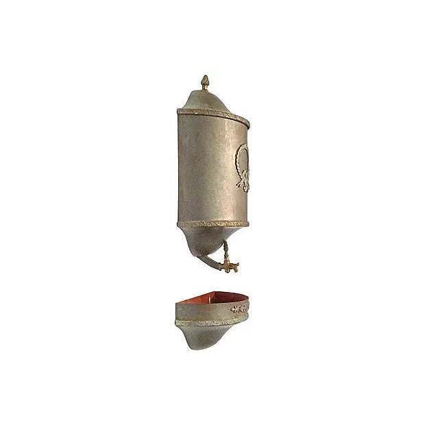 Antique; 1900-1910, French, laurel wreath, steel, lavabo with lid, tank body, and bottom basin. The lavabo hangs and has a...