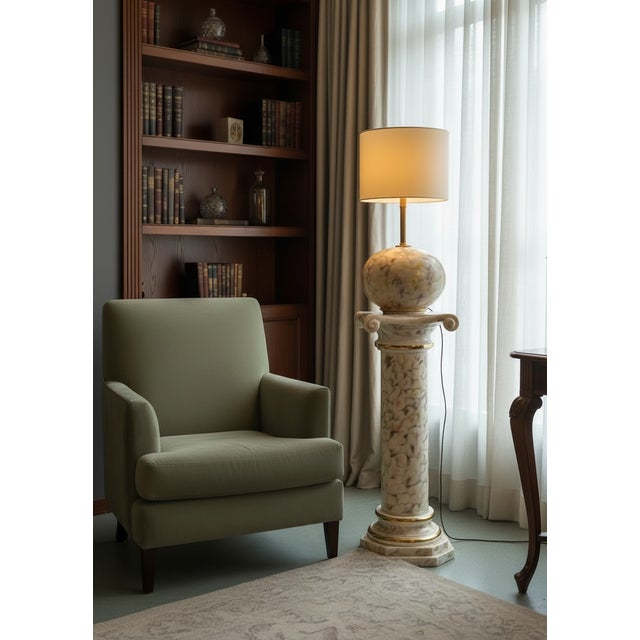 A distinctive italian decorative set from the 1980s, comprising a sculptural ceramic pillar and a matching table lamp....
