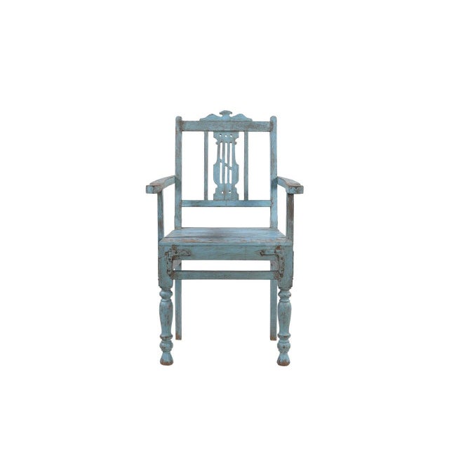 This Vintage Anglo-Indian Painted Teakwood Armchair is handcrafted from solid teakwood, featuring a beautifully carved...